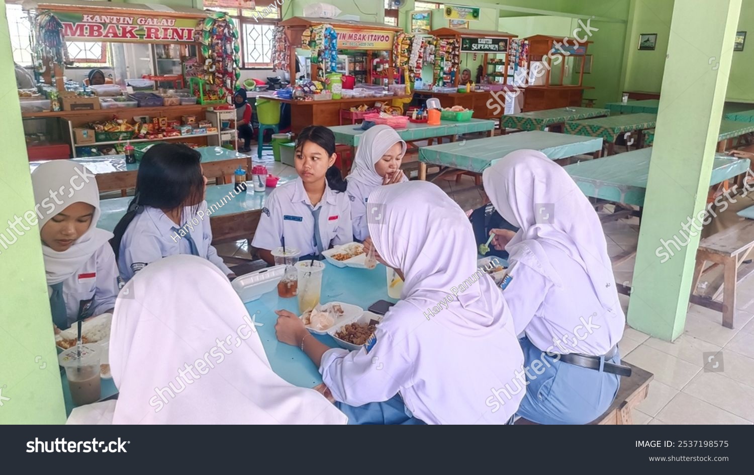 stock-photo-wuryantoro-wonogiri-central-java-indonesia-students-are-eating-in-the-school-2537198575